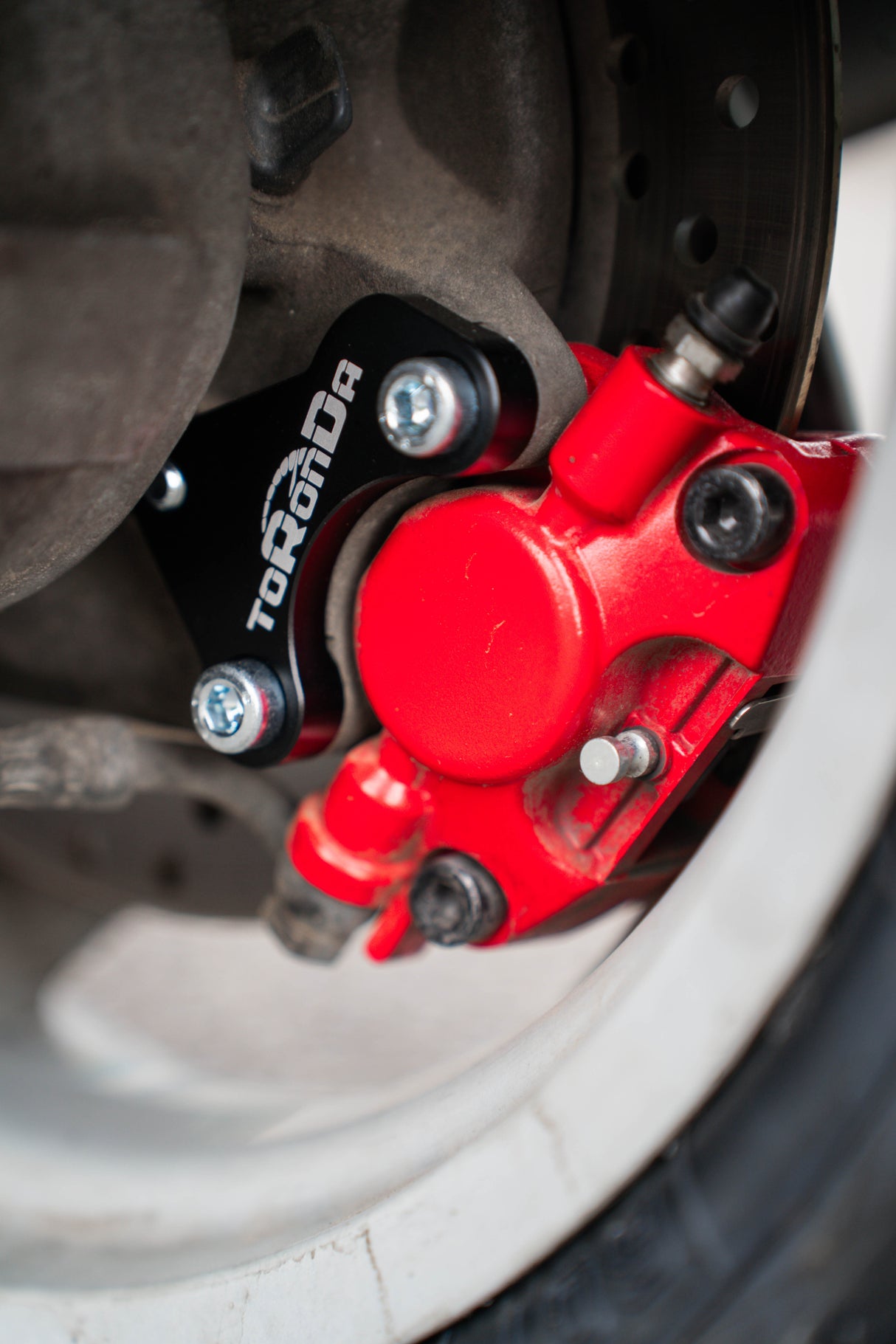 Support d'étrier de frein arrière Toronda Gilera Runner 125-180cc